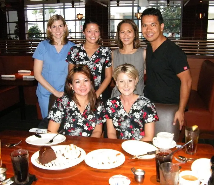 Photo of Jacksonville FL periodontal staff members: Laure’s & Arnie’s Birthday Luncheon